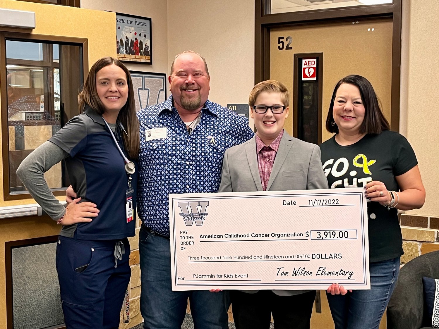 Wilson Elementary School students and staff recently held a fundraiser and donated nearly $4,000 to the American Childhood Cancer Organization! This fundraiser event began last year in honor of a former Wilson student, now in junior high school, who was diagnosed with a brain tumor.